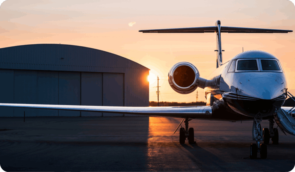 Plane on the tarmac at sunset